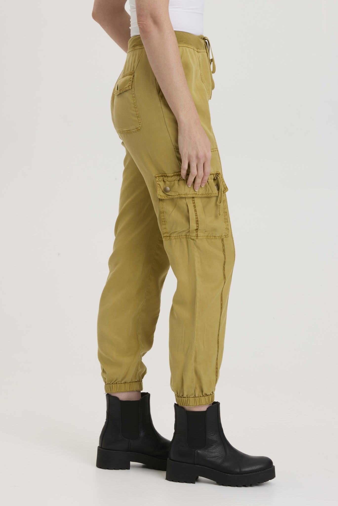 Unleash your inner adventurer with the XCVI Poe drawstring cargo joggers. These stylish and functional pants feature a drawstring waist for a customizable fit and cargo pockets for all your essentials. So comfortable, you'll want to wear them on all your adventures (and maybe even for lounging around the house, we won't judge).