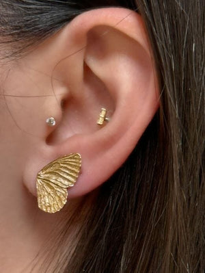 Flutter into style with Athena Designs' Drew earrings, featuring natural bronze butterfly posts for a unique look that will surely catch some eyes. These earrings are perfect for adding a touch of whimsy to any outfit.