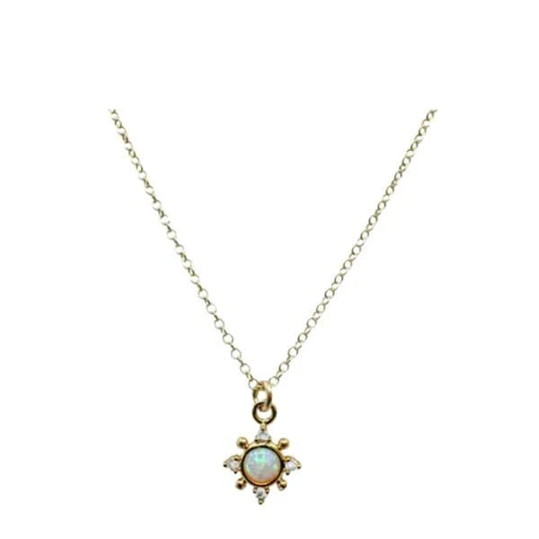 Shine bright like a dainty opalite star with Athena Design's Apple Necklace! This delicate starburst pendant shines with iridescent beauty, adding a touch of celestial charm to any outfit. Elevate your style and channel your inner goddess with this stunning necklace.