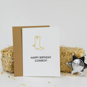 Our "Happy Birthday, Cowboy" card is letterpress printed on a vintage printing press in sunny California. Card includes a heavy duty cowboy boot paper clip. Paperclip can be used as a giftcard or cash holder on the inside of the card. Once you are finished using with the card, it can be used as a paperclip or bookmark.