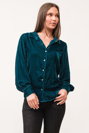 Experience casual sophistication with Dear John's Mirabelle top. Featuring a flattering V-neck, long sleeves, and convenient button-up design, this top is not only stylish but also easy to care for with its machine washable fabric. Take your wardrobe to the next level with this versatile and effortless top.