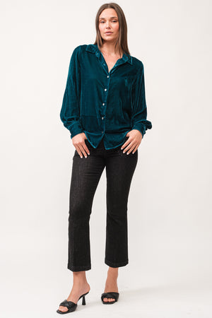 Experience casual sophistication with Dear John's Mirabelle top. Featuring a flattering V-neck, long sleeves, and convenient button-up design, this top is not only stylish but also easy to care for with its machine washable fabric. Take your wardrobe to the next level with this versatile and effortless top.