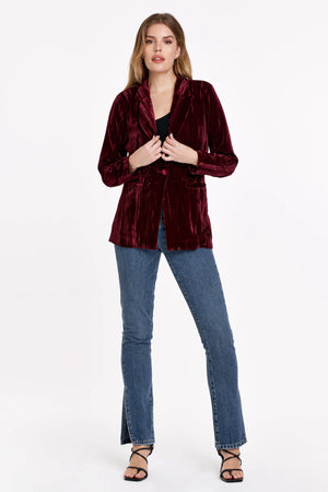 Blazer jacket long sleeve with button closures, patch pockets in crimpled velvet body. Ever versatile, perfect blend of chic or formal with that extra sazz of velvety luxe &amp; shine! Solid color woven on standard fit.