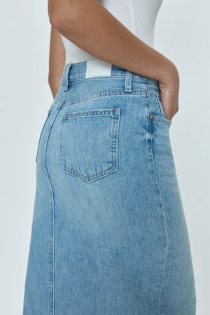 Of-the-moment, yet eternally stylish - our best selling skirt features an elongated midi length and five pocket denim design notes. Crafted from rigid denim without stretch for sophisticated fit and fall, with a well considered front skirt slit for ease of movement. Brooklyn is a clean, light wash denim with a touch of vintage inspired fading.