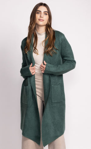 Our bestseller the Stockport is an oversized cardigan-like jacket that hits below the knee. It's a versatile piece that's bound to keep you warm at the office as well as when you run errands.