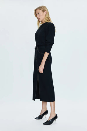 Of-the-moment, yet eternally stylish - our best selling skirt features an elongated midi length and five pocket denim design notes. Crafted from rigid denim without stretch for sophisticated fit and fall, with a well considered front skirt slit for ease of movement. Noir is deeply saturated black washed denim with vibrant contrast stitching.