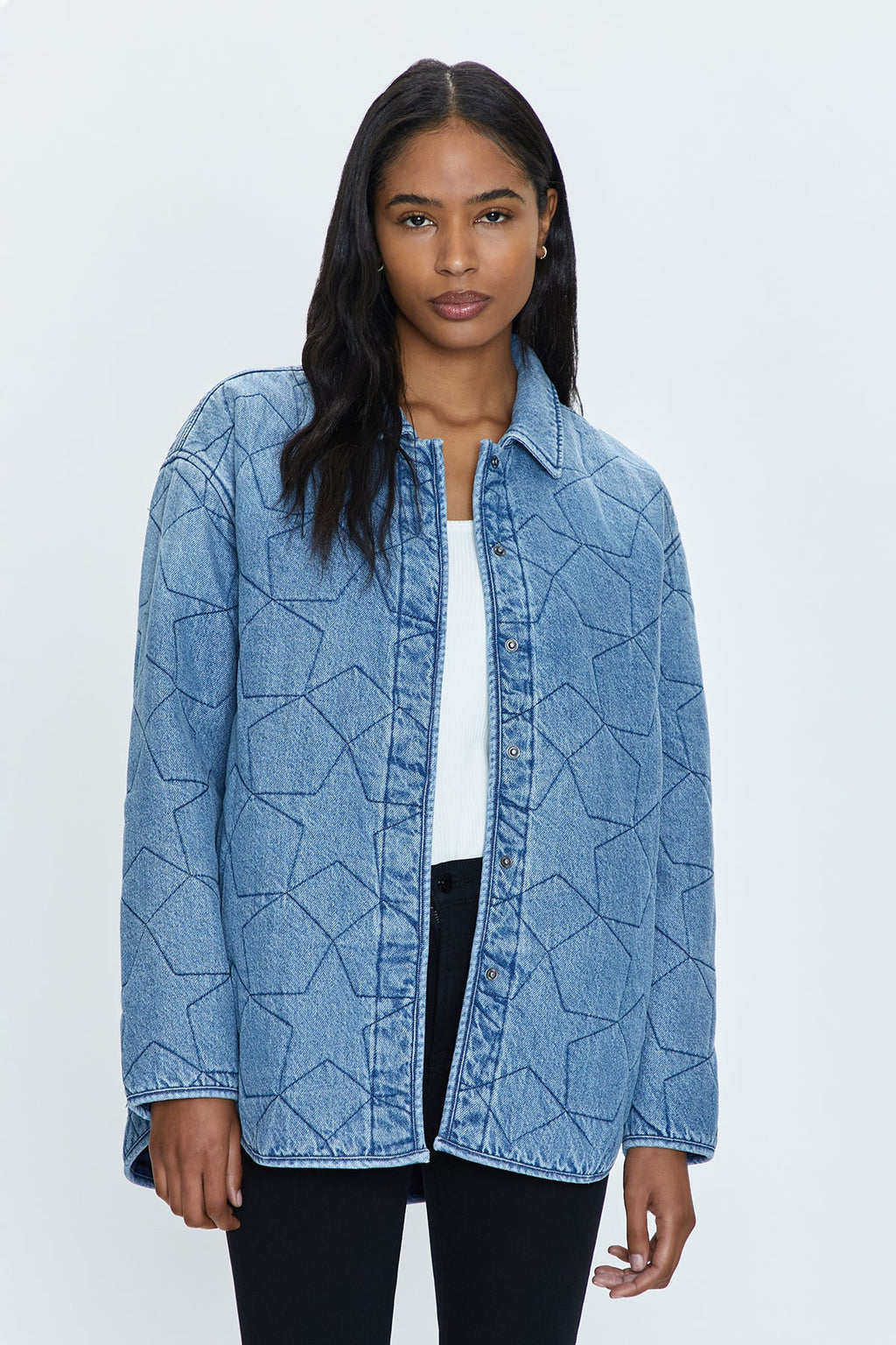 Star quality. Oversized, quilted shirt-jacket with a medium weight construction designed for transitional wearability. Concealed snap button closure at front and cuffs, with side pockets and a collar neckline. Marmont Star is a geometric, embroidered star motif in a clean and classic denim blue hue.&nbsp;