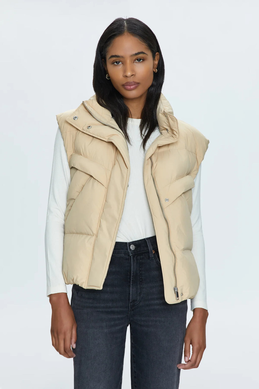 Stay warm and stylish with Pistola's Joss quilted puffer vest. Perfect for chilly days, this vest adds a touch of fun with its unique quilted design. Stay cozy and chic all season long!