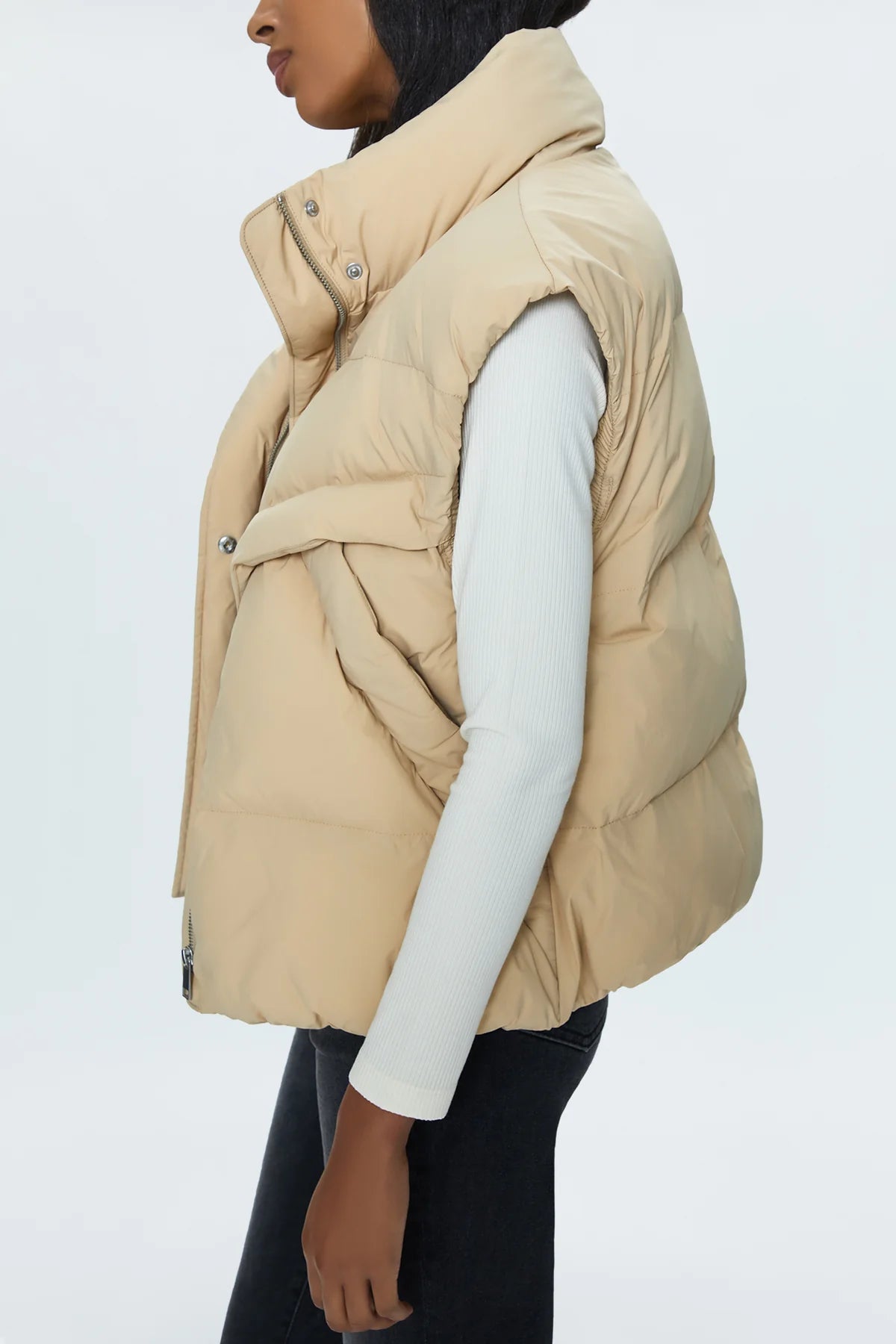 Stay warm and stylish with Pistola's Joss quilted puffer vest. Perfect for chilly days, this vest adds a touch of fun with its unique quilted design. Stay cozy and chic all season long!