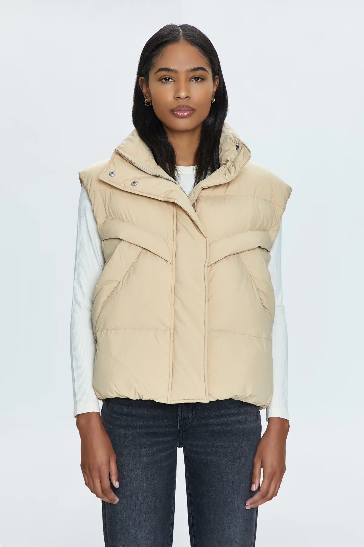 Stay warm and stylish with Pistola's Joss quilted puffer vest. Perfect for chilly days, this vest adds a touch of fun with its unique quilted design. Stay cozy and chic all season long!