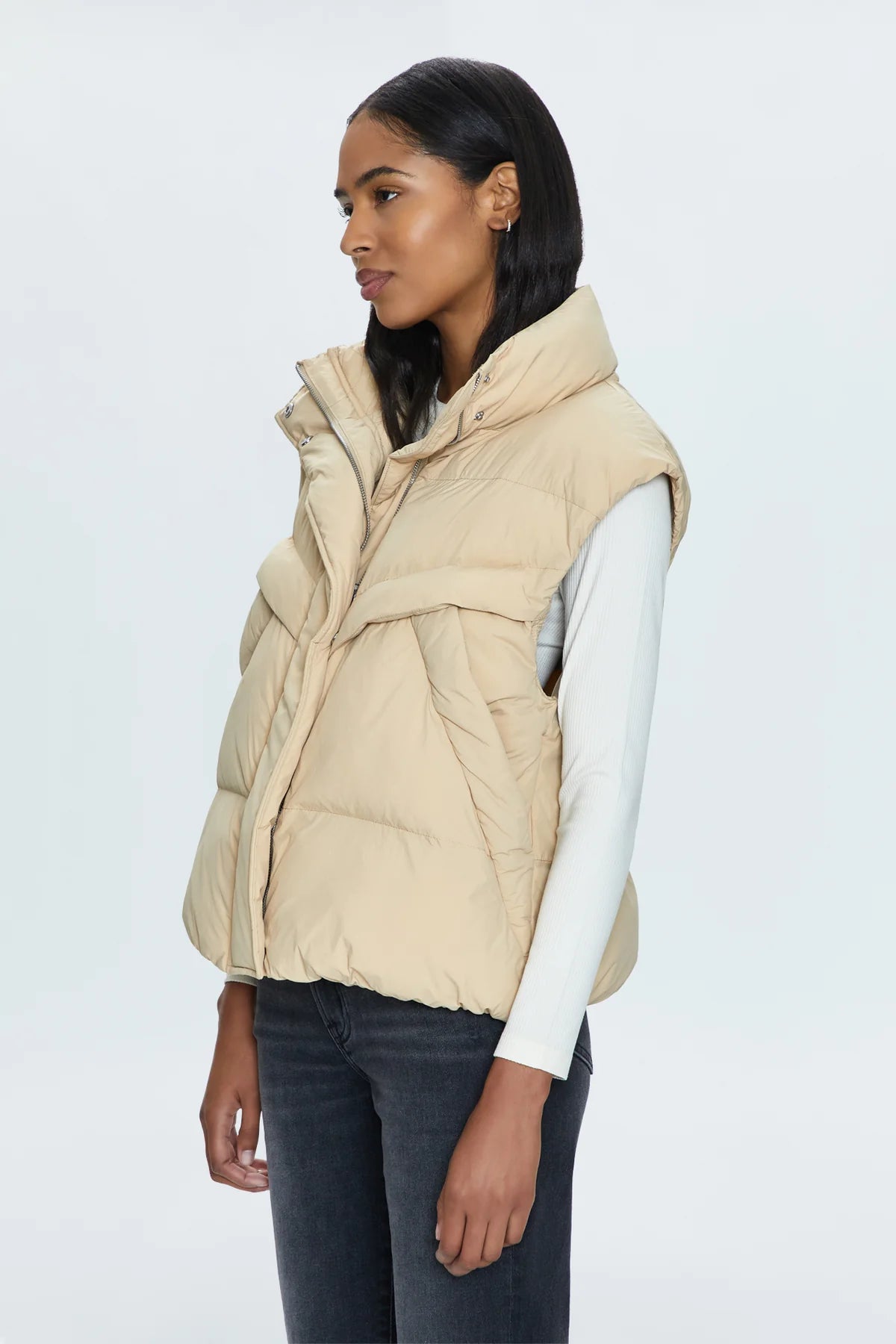 Stay warm and stylish with Pistola's Joss quilted puffer vest. Perfect for chilly days, this vest adds a touch of fun with its unique quilted design. Stay cozy and chic all season long!