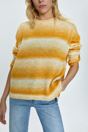 &nbsp;Lightweight transitional sweater crafted from a knit blend with a touch of wool. Crewneck silhouette with long sleeves, raglan shoulders, and a relaxed fit. Sunset is a dip-dye striped color effect featuring warm shades of ivory, yellow, and orange.