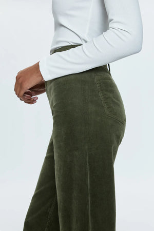 High rise waist, with a wide leg silhouette and a cropped, ankle length hemline. Crafted from a soft textured corduroy fabrication with our signature comfort stretch denim. Finished with a double stitched waistline and wide cuffed hems. Martini is a warm, deep olive green colorway with a subtle sheen.&nbsp;