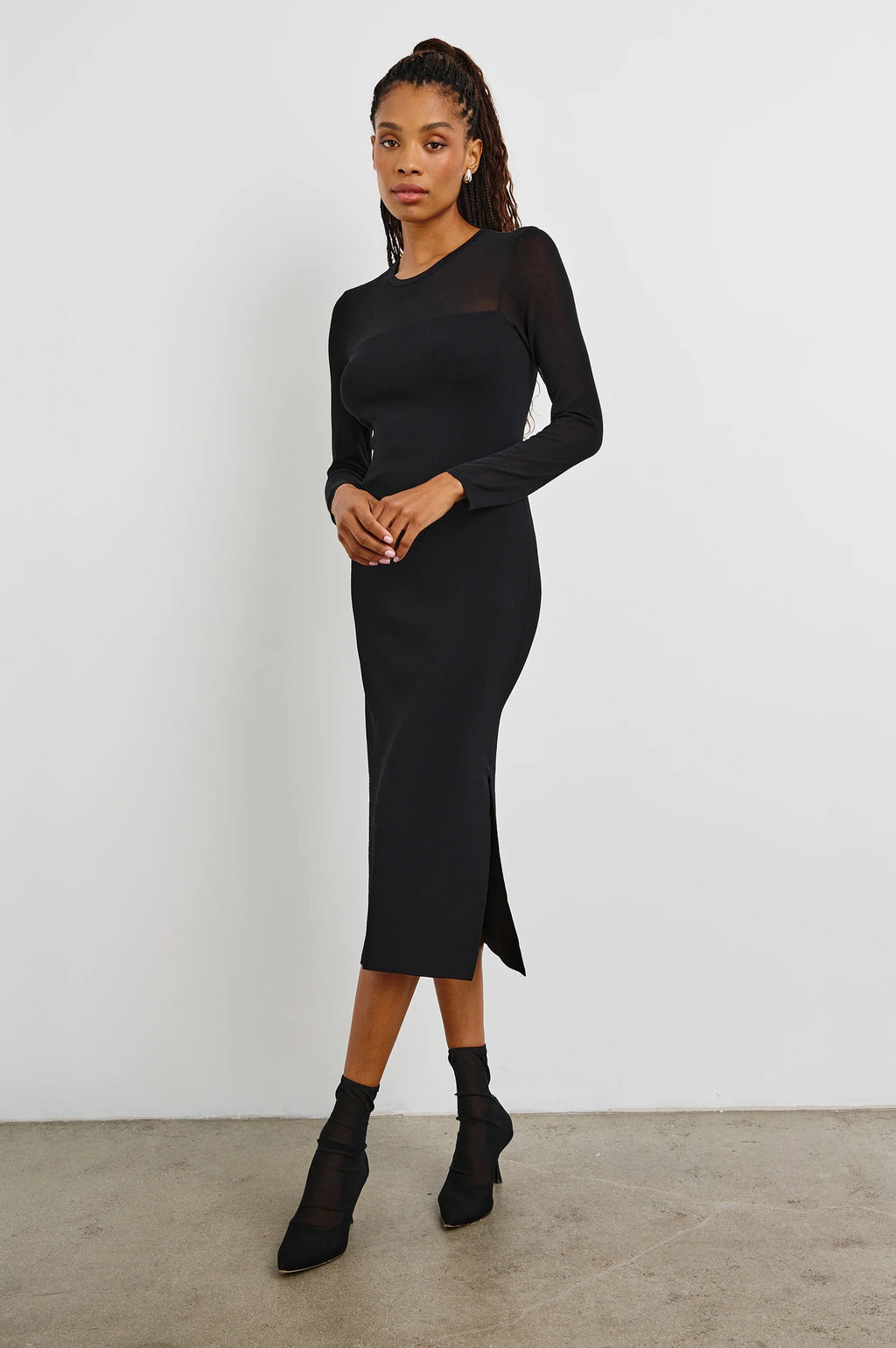 A sweater dress crafted from compact-stretch viscose nylon and a transparent yoke, the Luz is a 90's inspired staple for events season. Wear with heels or favorite flats to turn heads all season long.