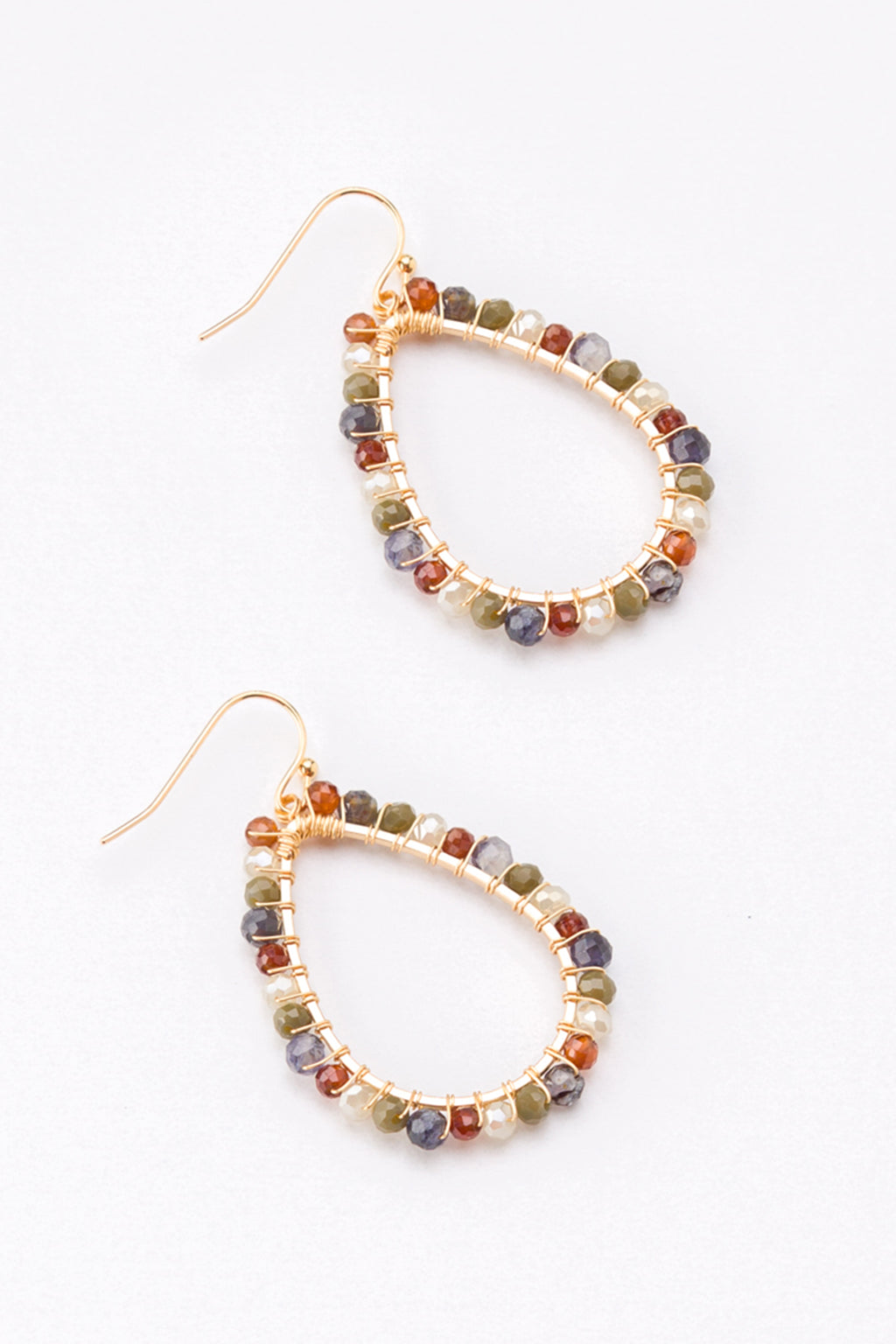 Pair of beaded earrings on a white background