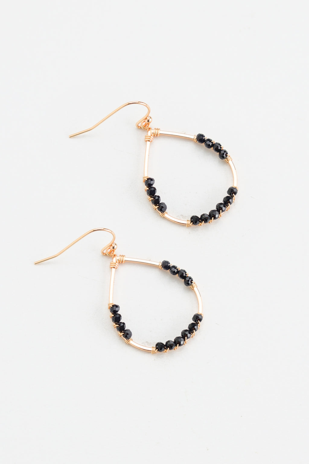 Sparkle the night away with Nakamol's Zola teardrop earrings! With an elegant silhouette and a pop of black spinel stones, these earrings will have you looking dazzling wherever you go. Put 'em on and sizzle like never before!