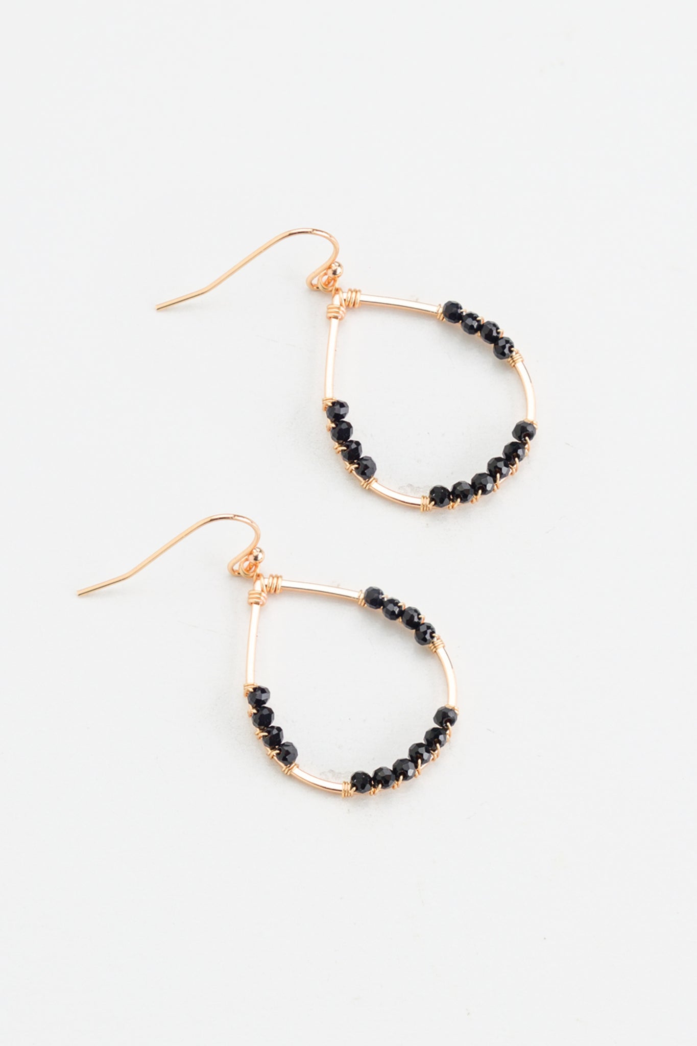 Sparkle the night away with Nakamol's Zola teardrop earrings! With an elegant silhouette and a pop of black spinel stones, these earrings will have you looking dazzling wherever you go. Put 'em on and sizzle like never before!