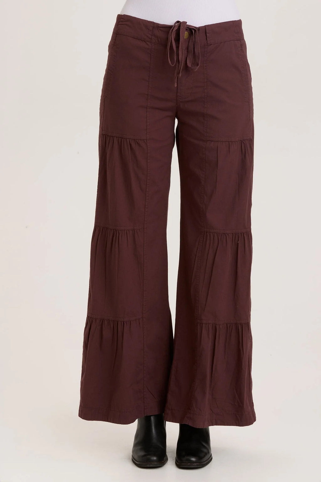 It's back by popular demand: our signature terraced ruched wide leg pant, with a flat drawstring waist, back elastic, zip fly and side seam pockets.