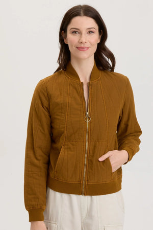 Another classic in a fun fabric! This clean bomber features a cotton quilted design and rib trims.