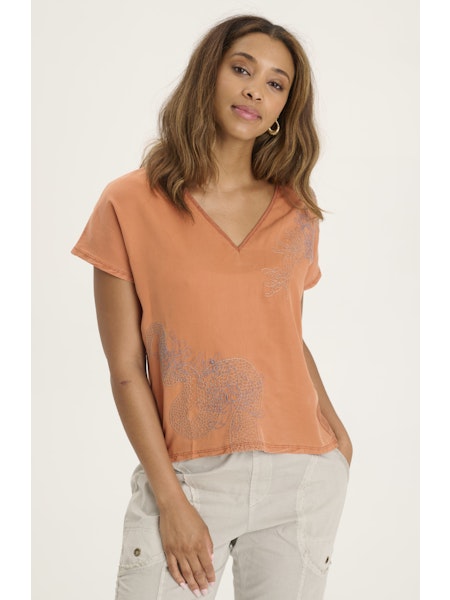 Boost your wardrobe with this XCVI Jolina top! With its unique v-neck design and beautiful embroidery, you'll stand out in style. Perfect for adding a playful touch to any outfit. (Trust us, it's v-neckin' fabulous!)