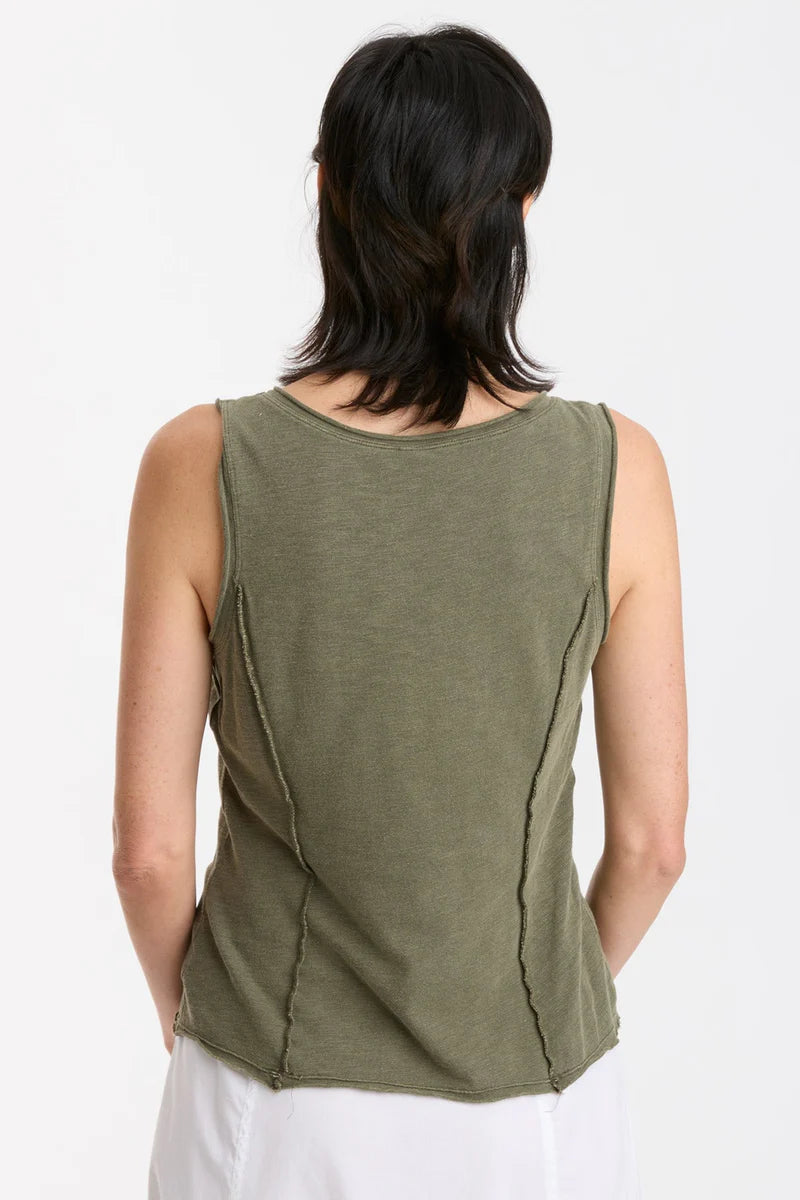 In slub jersey, the bra-friendly Laramie Tank features reversed stitched princess seams, a v-neck cut, and raw-edge details at the neck, hem, and armhole.