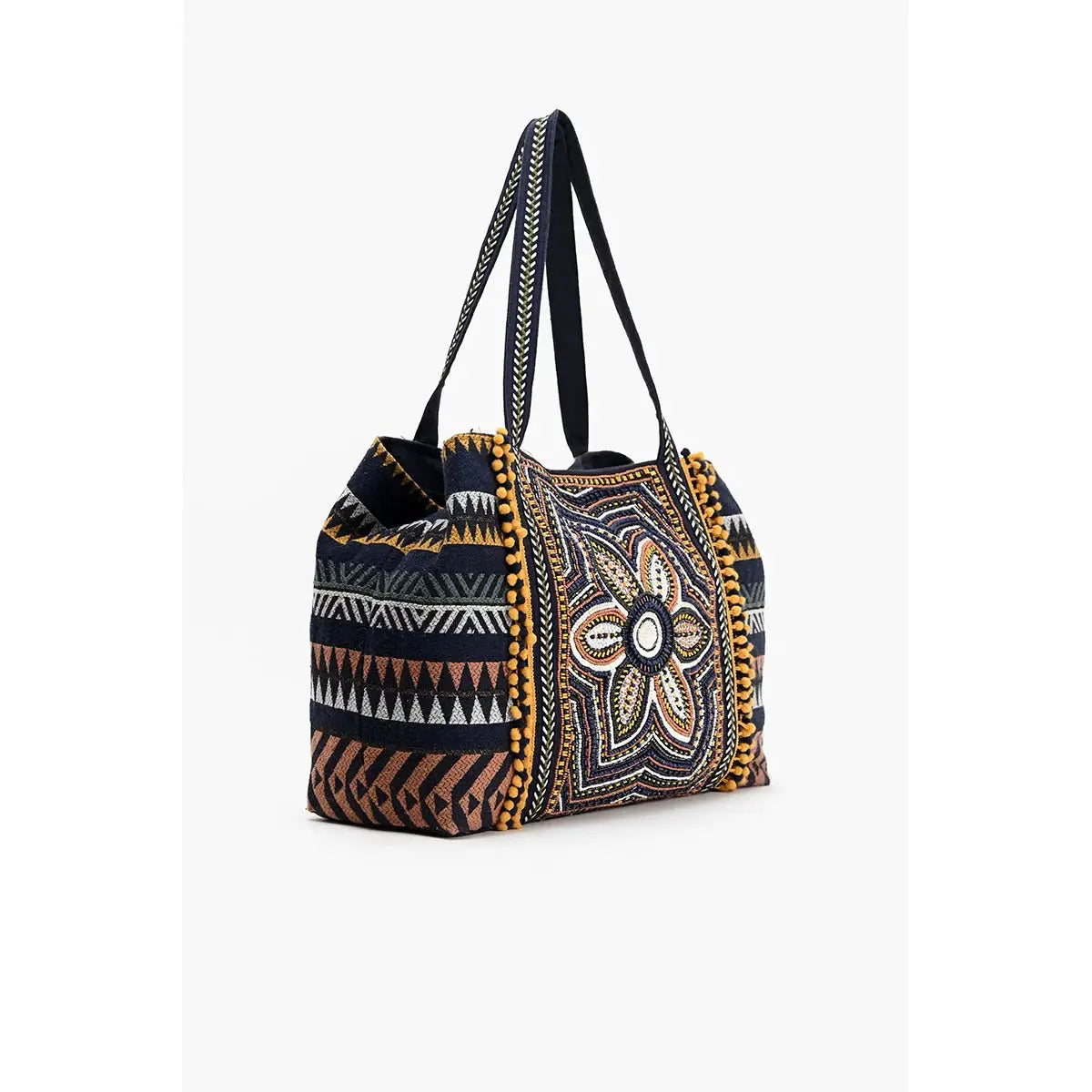 Decorative tote bag with tribal patterns on a white background