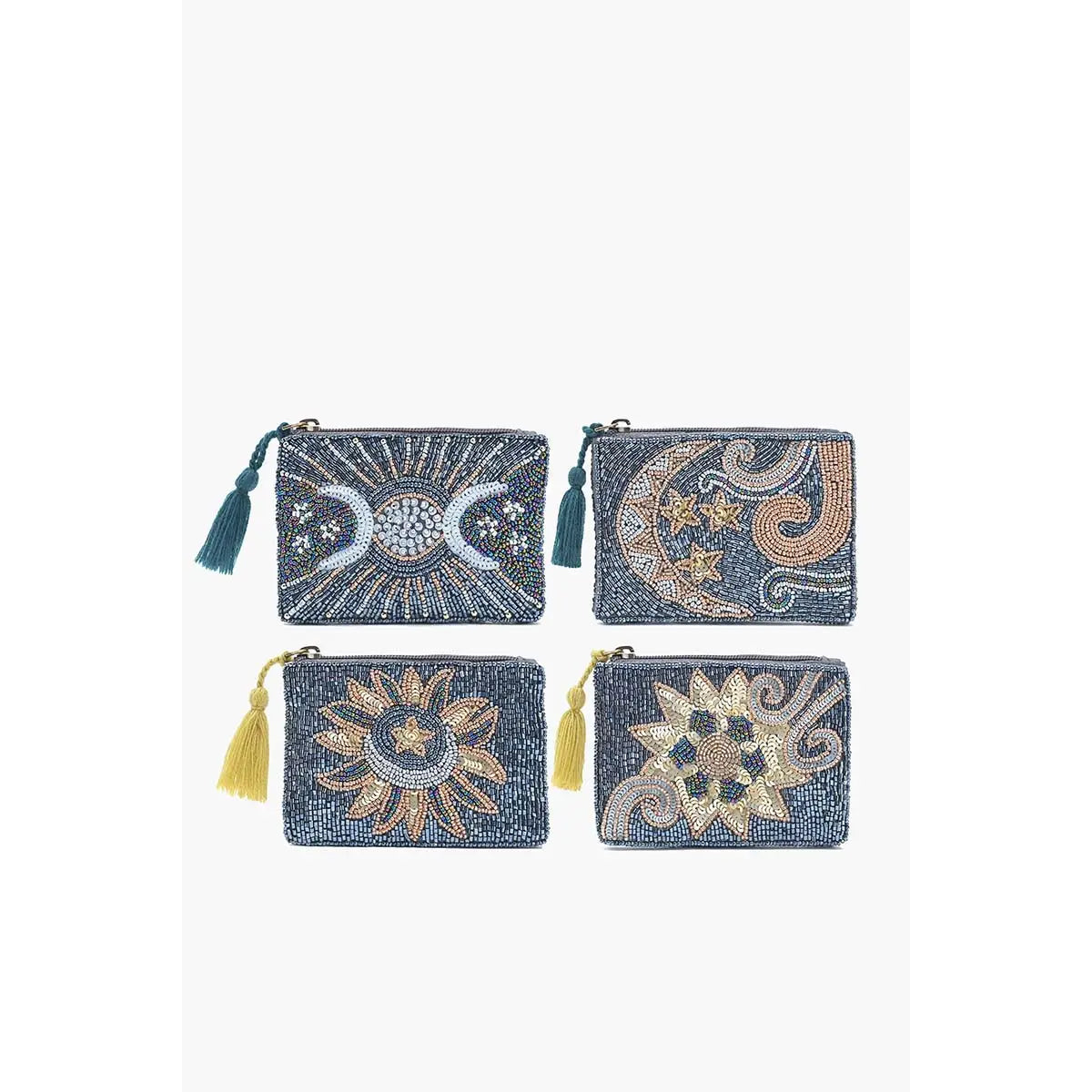 Four embroidered pouches with celestial designs on a white background