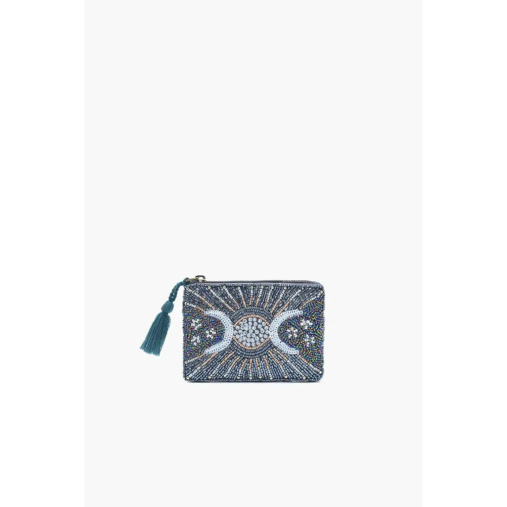 Decorative pouch with intricate design and tassel on a white background