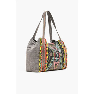 Gray tote bag with colorful tribal pattern on a white background