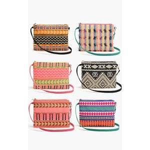 Elevate your accessory game with our Spring Clutch! This playful handheld treasure features a handwoven pattern jacquard with dazzling front beads that catch the light with every movement. 