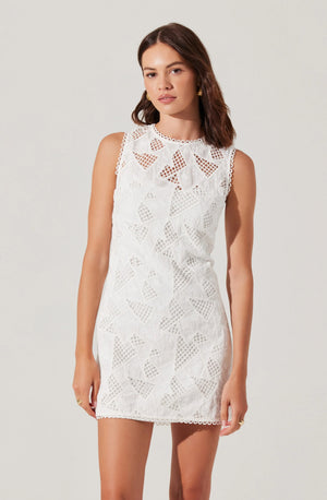 This playful crochet lace mini dress features a sleeveless design and a charming scalloped neckline, perfect for adding a flirty touch to your summer wardrobe. Its delicate texture and flattering cut make it ideal for sunny days and casual outings.