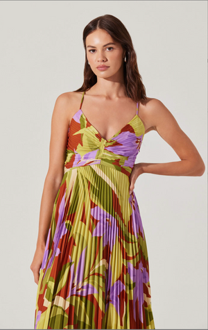 Step into sunshine with the Astr | Blythe maxi dress, blooming with a lively floral print that dances with every step. Its flowing silhouette offers comfort and freedom, perfect for twirling through warm days or making a statement at your next garden party. Embrace effortless charm and playful elegance wherever you go.