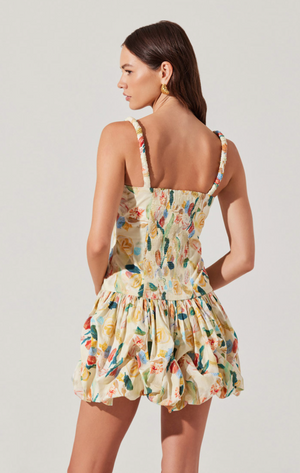 Flaunt your playful side in our Astr | In Bloom dress. With a floral bubble skirt, this dress will have you feeling blooming lovely all day. Perfect for a fun day out or a casual date night. Time to bloom like never before!