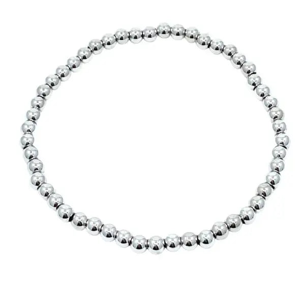 Silver beaded necklace on a white background