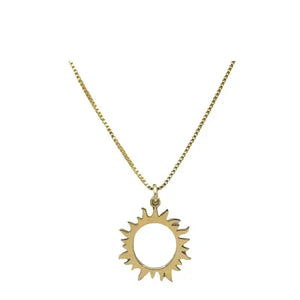 Gold necklace with a sun-shaped pendant on a white background