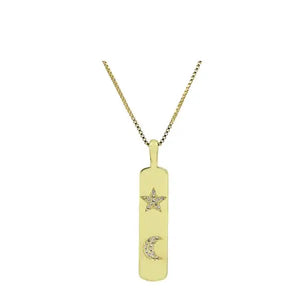 Gold necklace with a pendant featuring a star and moon design on a white background