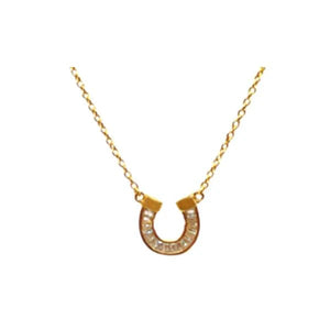 Ride into luck with the Athena Designs Simone necklace. This stunning pave micro crystal horseshoe necklace adds a touch of sparkle to any outfit. Don't horse around, grab this lucky charm and elevate your style game.