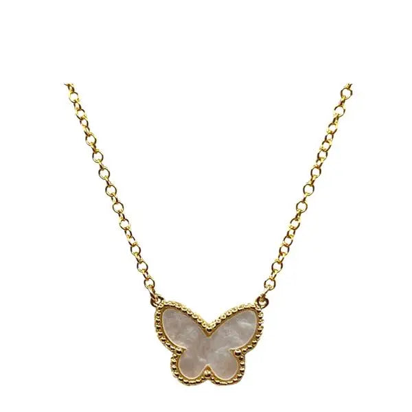 Butterfly-shaped pendant necklace on a gold chain against a white background