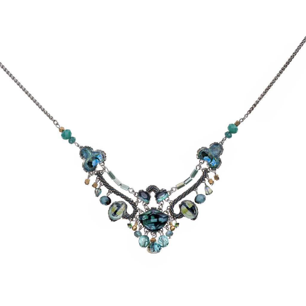 Necklace with blue and green gemstones on a white background