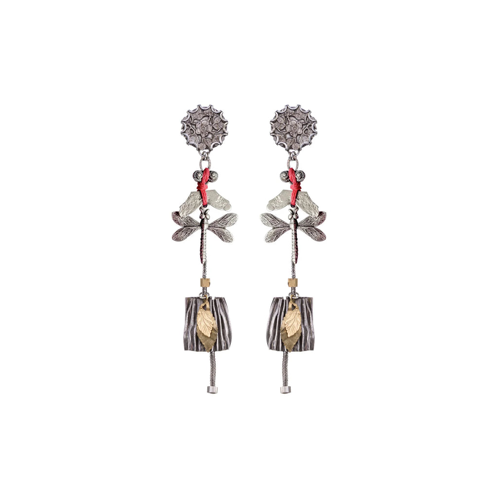 Pair of earrings with floral and bell design on a white background