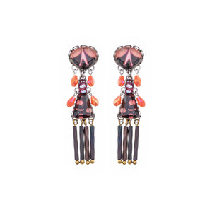 Pair of earrings with heart-shaped top and long dangling elements on a white background