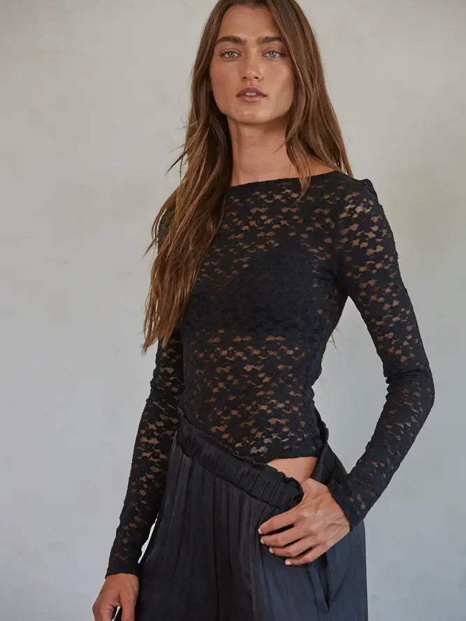 Slip into this bodysuit and feel instantly fierce with its floral lace detail. Perfect for date night (or a solo dance party), the Lizzie bodysuit by By Together will have you looking and feeling confident all night long. No more wardrobe malfunctions, just pure style.