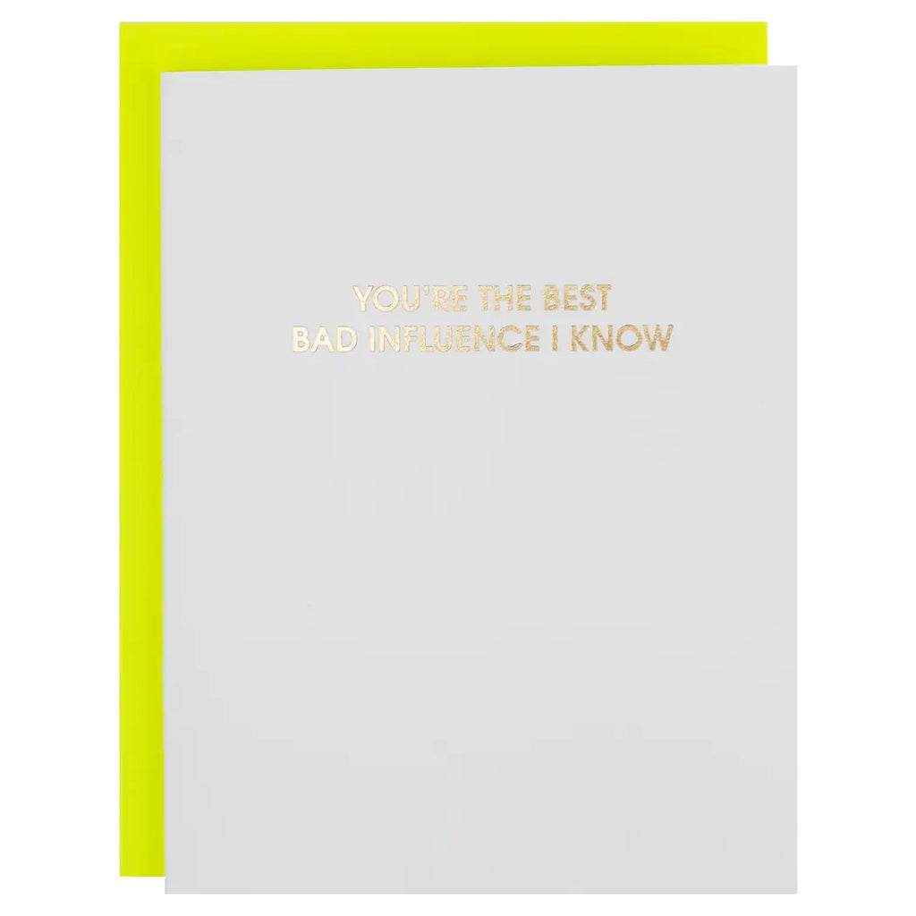 Greeting card with gold text 'You're the best bad influence I know' on a white background with a yellow border.