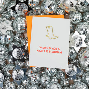 Our "Wishing You A Kick Ass Birthday" card is letterpress printed on a vintage printing press in sunny California. Card includes a heavy duty cowboy boot paper clip. Paperclip can be used as a giftcard or cash holder on the inside of the card. Once you are finished using with the card, it can be used as a paperclip or bookmark.