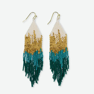 Whether you're making a statement at the office holiday party or just bringing some spirited glam to brunch with the girls, the Claire earrings are guaranteed showstoppers. Let their swingy emerald fringe elevate any ensemble, from elegant evening looks to tried-and-true vintage denim.