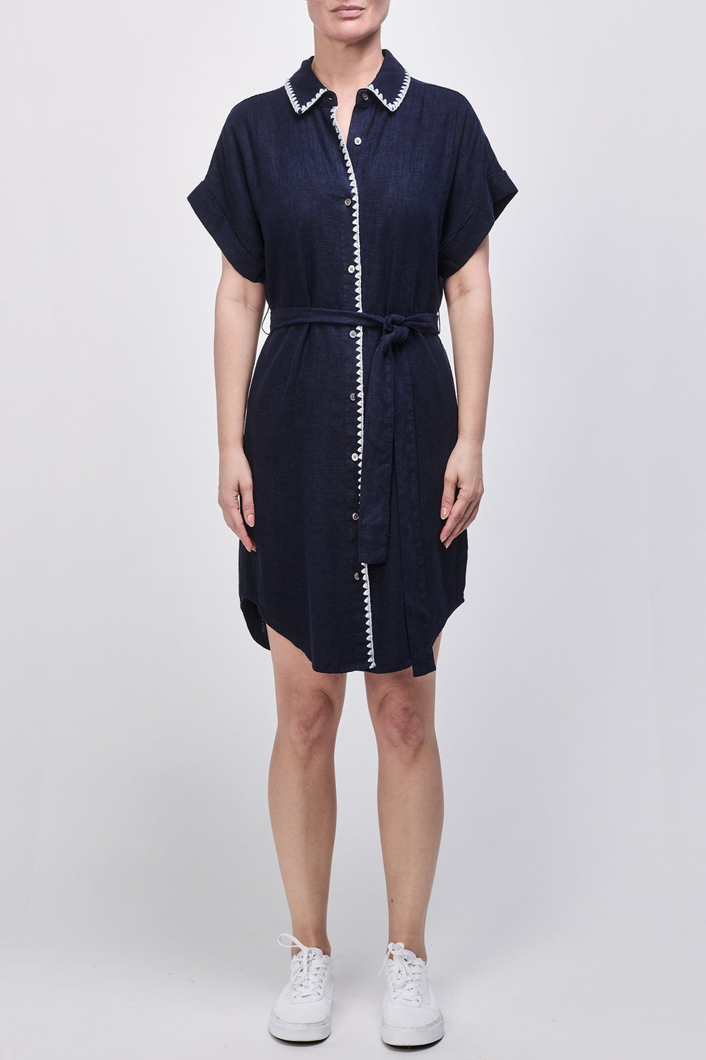 Rock the casual yet chic look with the Dear John Albany dress. This collared dress features short sleeves and a button-up design, perfect for any occasion. Stay comfortable and stylish all day long!