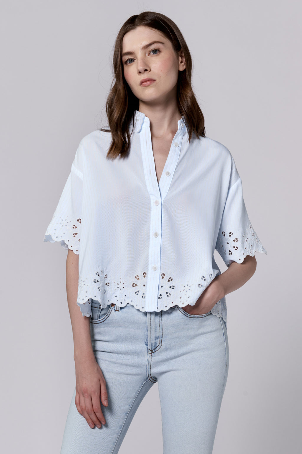 This top is the perfect addition to your wardrobe. Its short sleeves and button-up design make it both stylish and practical. With a flattering v-neck, it's perfect for any occasion. Stay chic and comfortable with Dear John | Ansel.