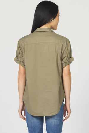 The Dear John Benning shirt brings effortless style with its button-down front and roll-up sleeves, perfect for a laid-back vibe. Designed with a relaxed fit, it’s your go-to for comfort without sacrificing cool. Whether you’re out for brunch or just chilling, this shirt adds a playful touch to any outfit.