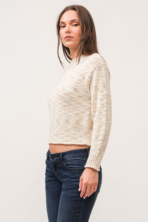 Indulge in the cozy and playful style of Dear John's Britney sweater. Made with space dyed yarn and a ribbed design, this sweater will keep you warm and stylish during chilly days. Embrace the quirky side of fashion with this unique and comfortable sweater.