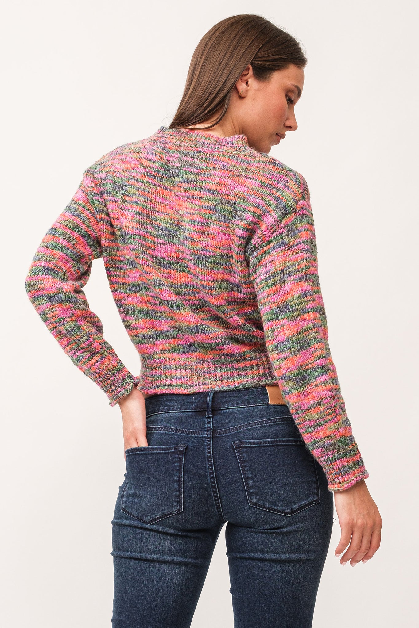 Indulge in the cozy and playful style of Dear John's Britney sweater. Made with space dyed yarn and a ribbed design, this sweater will keep you warm and stylish during chilly days. Embrace the quirky side of fashion with this unique and comfortable sweater.